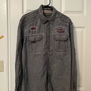 My husband wore this shirt 10-15 times, it is in good condition